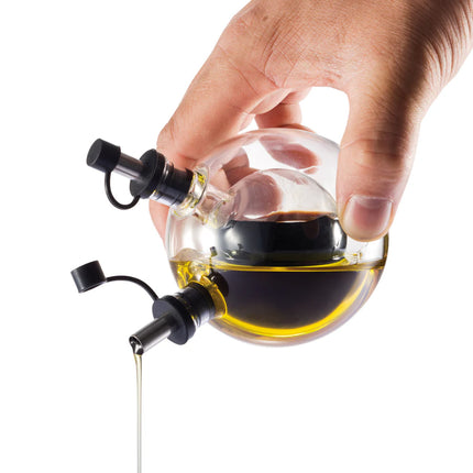 XD Design Orbit oil and vinegar set with sleek glass bottles and stainless steel pour spouts for kitchen use