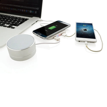  shown on a sleek surface with devices placed on it.