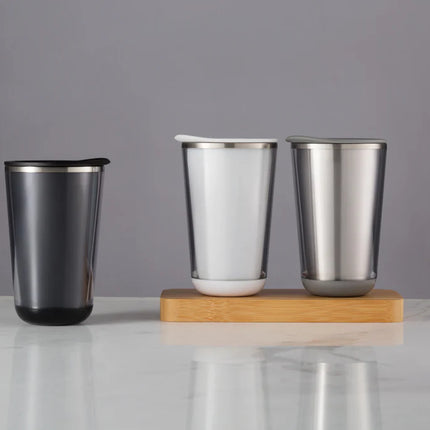  a sleek stainless steel drinkware container with a secure lid