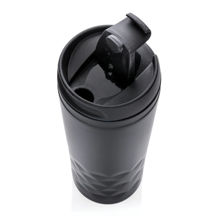Geometric mug from XD Collection drinkware featuring a modern black and white geometric pattern on ceramic.