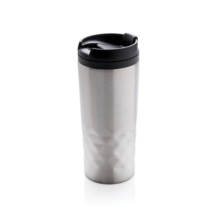 Geometric XD Collection drinkware mug with modern black and white geometric pattern on ceramic surface.
