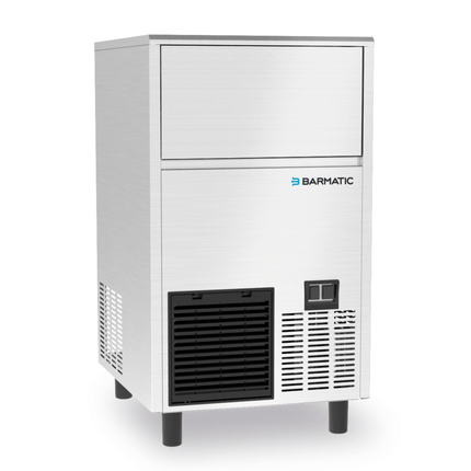 Barmatic air-cooled ice cube maker producing clear ice cubes, with 47kg daily capacity and 28kg storage container.
